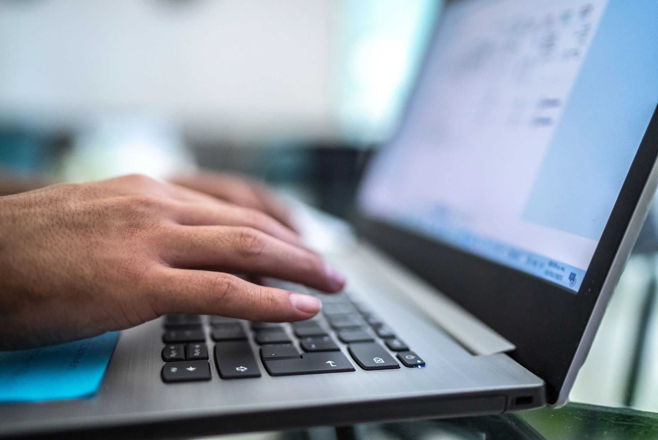 Technician reviewing diagnostic information on a laptop